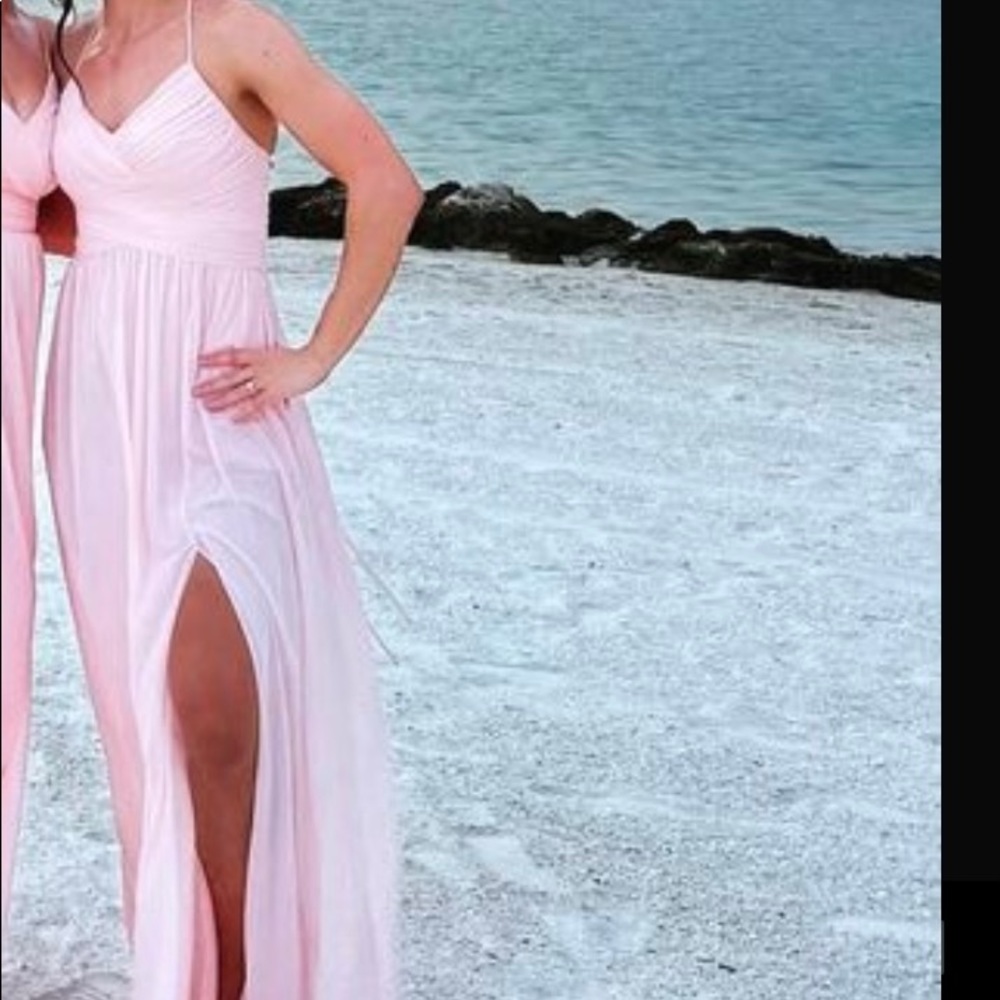 Woman’s blush pink evening gown